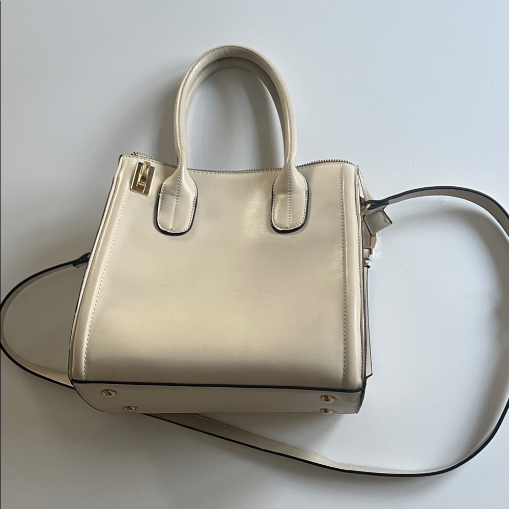 3 for $30 
Elegant Cream Handbag